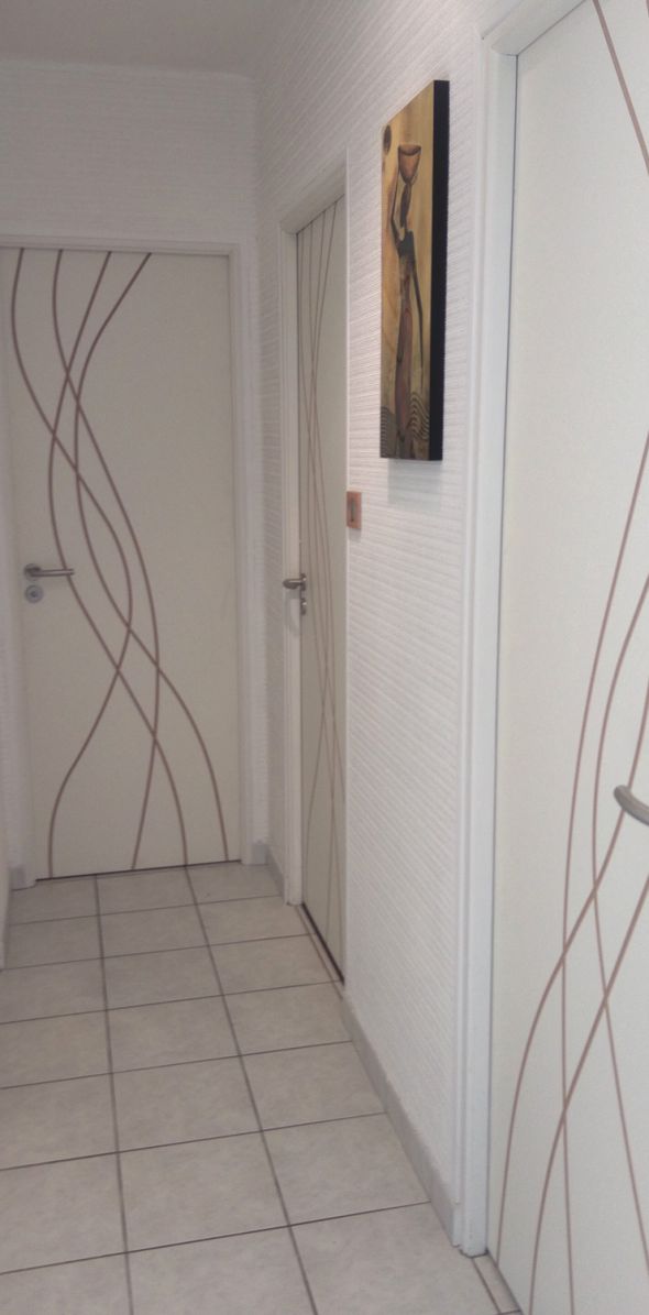 installation-pose-porte-interieure-blanc-couloir-chambre-menuiserie-marionneau-vallet-44-129DAEDBA-EEAF-9F67-D46B-FADE46AB2627.jpg