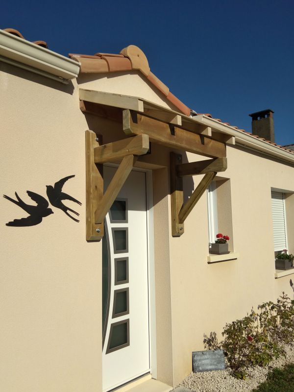 creation-installation-auvent-entree-pergola-bois-menuiserie-marionneau-vallet-44-2021-1D52739AB-CA38-0358-0F82-2C876370F840.jpg